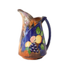 Blue Ceramic Pitcher with Various Fruits